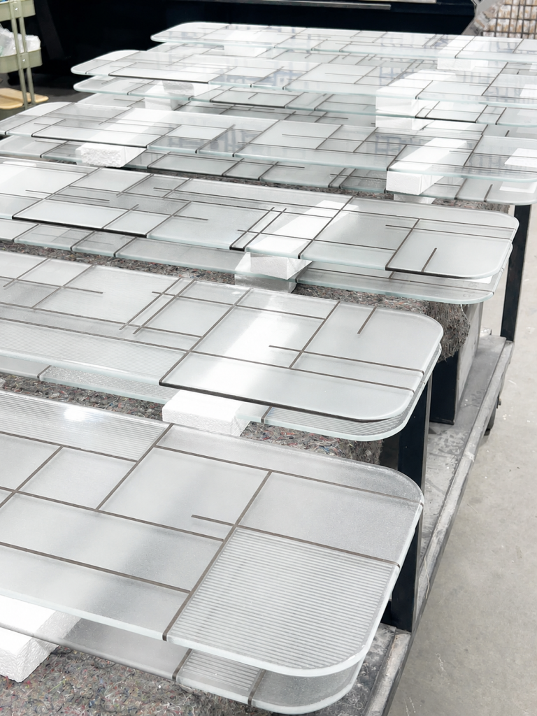 Bespoke Grid Glass panels during manufacture for The Ghan.